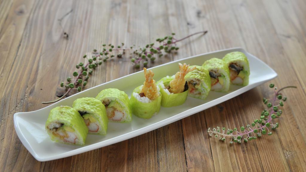Green Fuji · Spicy crabmeat, shrimp tempura, eel & avocado wrapped in green - soybean seaweed & eel with spicy - mayo sauce.