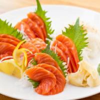 Salmon Don · 10 pcs salmon over rice. Served with side.
