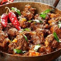 Lamb Roganjosh · Slow-cooked lamb married with traditional herbs and spices.