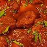 Lamb Vindaloo · Slow-cooked goat prepared with intense spices and herbs. Potatoes.