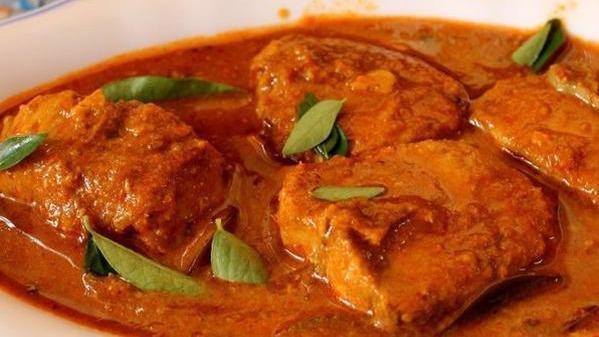 Fish Curry · Flounder cooked in Indian curry.