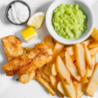 Irish Pub Style Fish & Chips · Beer battered cod served with chips and mushy peas.