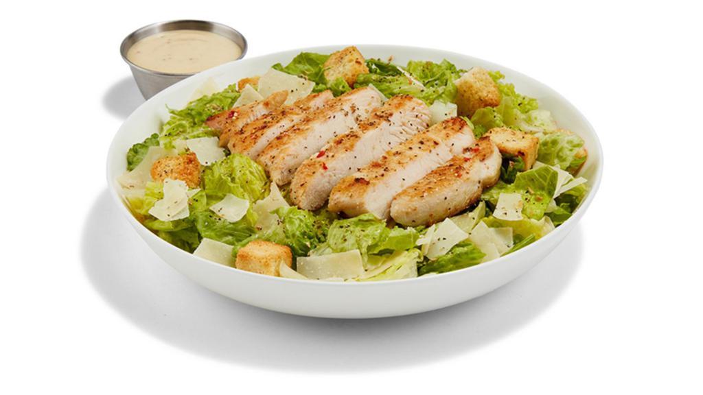 Chicken Caesar Salad · GRILLED CHICKEN / ROMAINE / PARMESAN GARLIC / CAESAR DRESSING / SHAVED PARMESAN / LEMON PEPPER SEASONING / CROUTONS