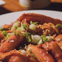 Ttuckppokki / 떡볶이 · Traditional Korean rice cakes simmered in a hot chili sauce
