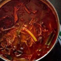 Yookgaejang / 육개장 · Spicy soup with shredded beef brisket, green onion, egg, Korean fernbrake, and cellophane no...