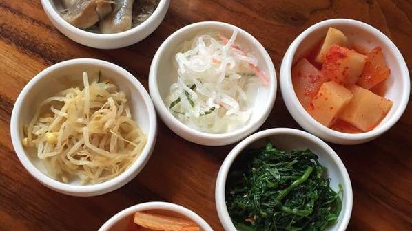 Banchan Sides (Pickled Things) · All kimchi sides are made with fish sauce soy pickled jalapeños soy pickled onions napa cabbage kimchi radish kimchi pickled white radish kirby cucumber kimchi.