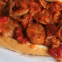 Italian Sausage And Peppers Hero · Italian sausage and peppers with fresh tomato sauce.