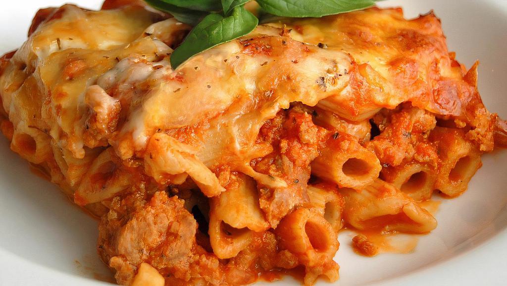 Baked Ziti · Ziti pasta mixed with ricotta and fresh tomato sauce topped with melted mozzarella.