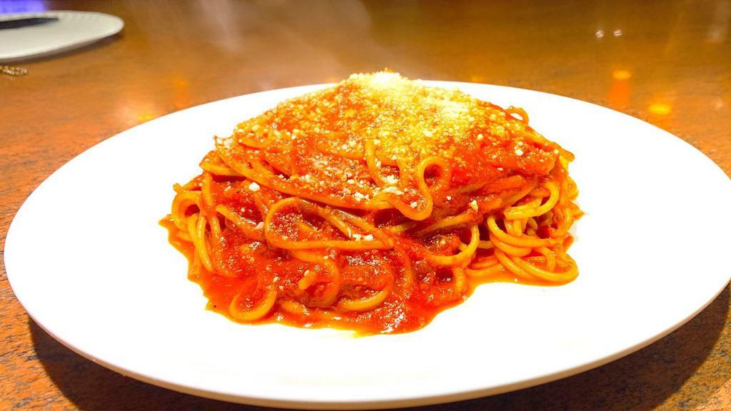 Spaghetti Marinara · Spaghetti pasta with house made marinara sauce, topped with grated Parmesan cheese.