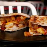 Honey Bbq Panini · Grilled chicken breast, crispy bacon, cajun home fries, melted cheddar jack cheese drizzled ...