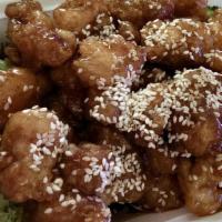 Sesame Chicken · With pork fried rice and egg roll.