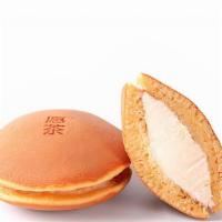 Cheese Dorayaki 芝士铜锣烧 · Honey based fluffy pancakes with our classic sweet and salty whipped cream cheese filling.
