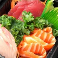 Sashimi Appetizer · 9 pieces of assorted fish (thin sliced).