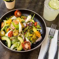 Nopalitos Salad · Diced-pickled Nopalitos (cactus) over little gems lettuce, tomato and sliced avocado. Topped...