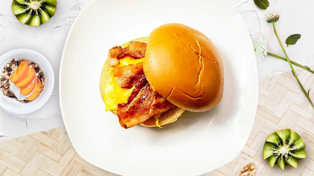 Bacon Breakfast Sandwich · Your choice of eggs, bacon, and cheddar cheese on your choice of bread.
