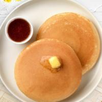 Classic Pancakes · Fluffy pancakes cooked with care and love served with butter and maple syrup. Served in pairs.