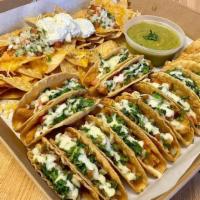 Taco Box · Our fully customizable taco experience. Choose the type of taco, the tortilla, and the side....
