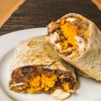 Chicken Burrito · Yellow rice, refried beans, cheese, grilled chicken breast stuffed in a flour tortilla.