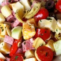 Antipasto Salad · A traditional Italian salad. Fresh vegetables, olives, mushrooms tossed in a light oil or vi...