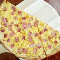 Hawaiian Californian Pizza · Mozzarella pie topped with cured ham and sweet chunks of pineapple.