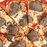 Chicago Meatball Pizza Slice · Chicago-style mozzarella pie topped with homemade Angus meatballs.