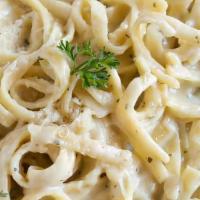 Chicken Alfredo · Chunks of tender chicken breast sautéed in a cream and butter sauce with egg yolks and sprin...
