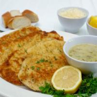 Chicken Milanese · Battered breast of chicken fried to perfection. Served with choice of side.