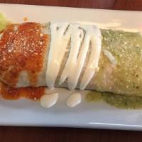 Pollo Burrito · Chicken. Flour tortilla stuffed with rice, beans, lettuce, tomato topped with red and green ...