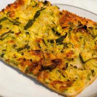 Zucchini Al Taglio · ZUCCHINI AL TAGLIO - sliced zucchini, gruyere cheese, breadcrumbs