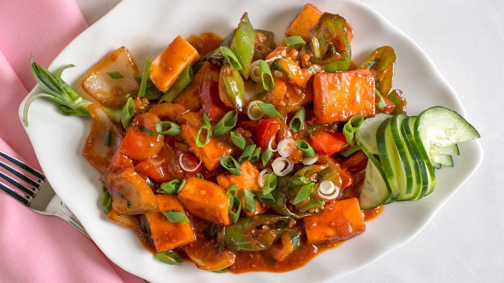 Chilli Paneer · Dry,  Spicy and Vegan. Cottage cheese sauteed with bell pepper and onions