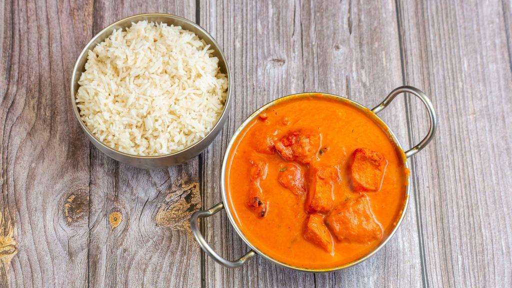 Chicken Tikka Masala Special · Boneless cubes of chicken cooked in tandoor and finished off with yogurt and creamy tomato sauce. Served with basmati rice and bread. And one appetizer.