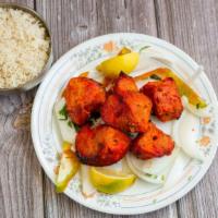 Chicken Tikka Special · Boneless chicken marinated with yogurt, spices, and cooked in clay oven. Served with basmati...