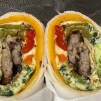 Morning Country Wrap · Our delicious wrap with eggs , spinach, green peppers, cheddar cheese,  sausage, lettuce
,to...