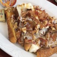 Omg French Toast · Dollops of sweet marscarpone cheese, walnuts in maple syrup, caramel drizzle and chopped app...
