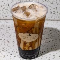 Tiger Milk Tea With Tapioca · Original milk tea with black sugar swirl and tapioca pearls.