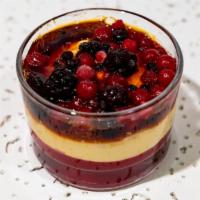 Creme Brulee With Berries · Glass cup.