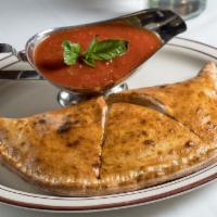 Calzone · Ricotta and mozzarella. Side marinara sauce.