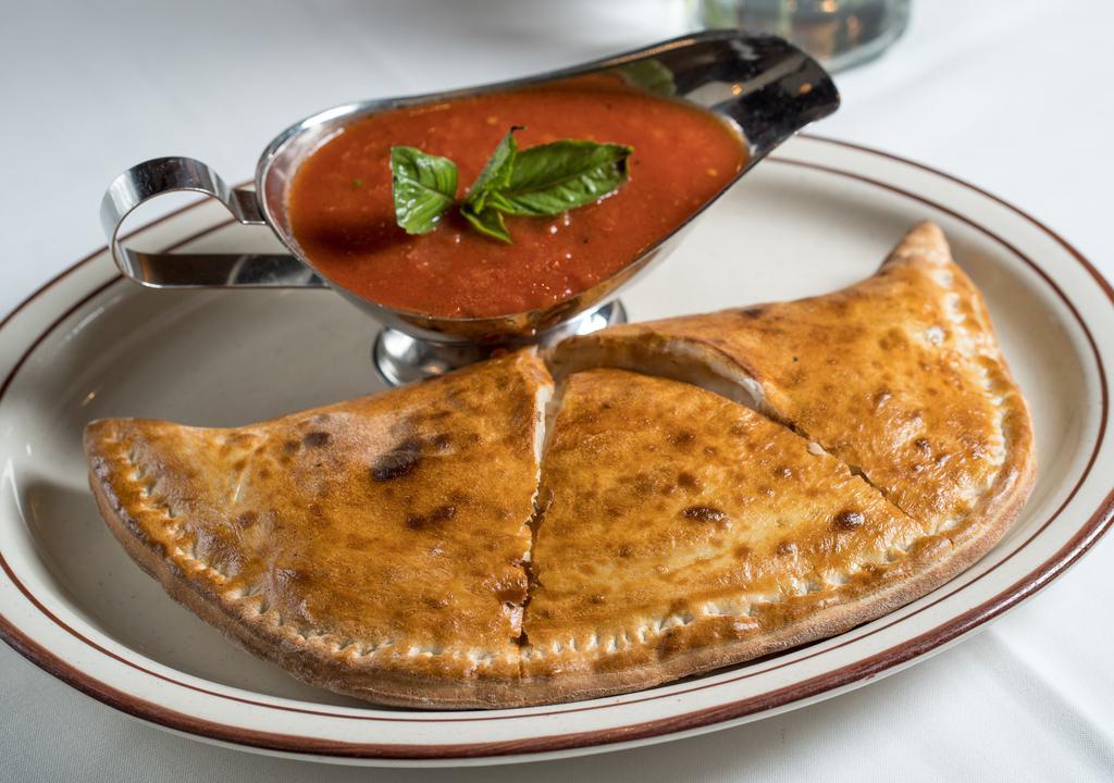 Calzone · Ricotta and mozzarella. Side marinara sauce.