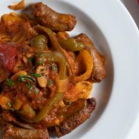 Spaghetti With Sausage & Peppers · Hot or sweet Italian sausage, mushrooms, peppers, onions, tomato sauce.