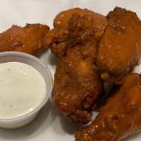 6 Buffalo Wings · 6 delicious wings served with blue cheese