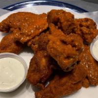 12 Buffalo Wings  · 12 delicious wings served with blue cheese