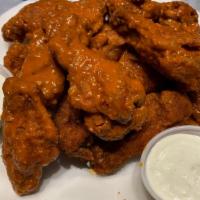 18 Buffalo Wings  · 18 delicious wings served with blue cheese