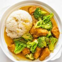 Chicken & Broccoli · Chicken & Broccoli topped with white sesame seeds, cooked in a garlic sauce served with whit...