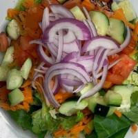 House Salad · Mixed greens, carrots, onions, cucumbers & tomatoes; served with a side of your choice of dr...