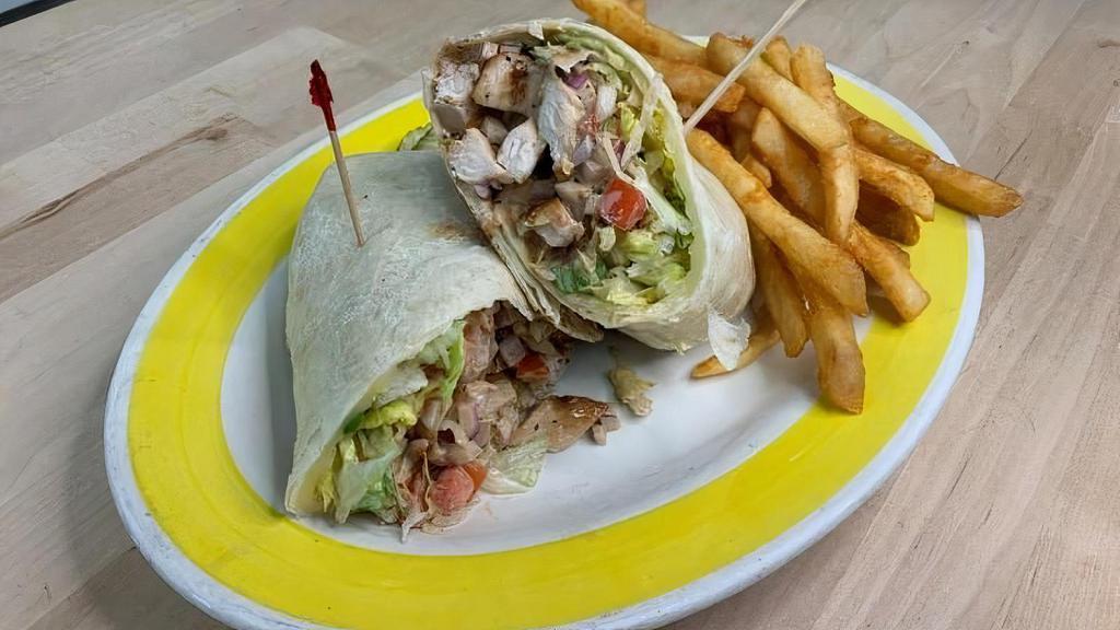 Grilled Chicken Sandwich · Grilled chicken, Swiss cheese, lettuce, red onions, tomatoes & house dressing; served on a hero or wrap