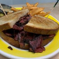 Pastrami Sandwich · Piled high on buttered & grilled rye