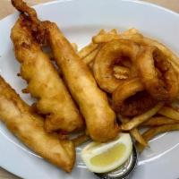 Galway Style Fish & Chips · Beer-battered cod filets deep fried & served with French fries, onion rings & tartar sauce