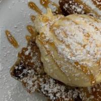 Celine'S Bread Pudding · Our warm raisin filled, sweet & delicious dessert topped with vanilla ice cream & caramel sa...