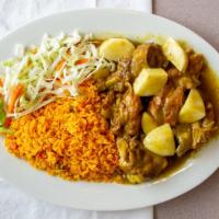 Curry Chicken Dinner · Chicken slow-cooked in Jamaican curry seasoning and herbs.