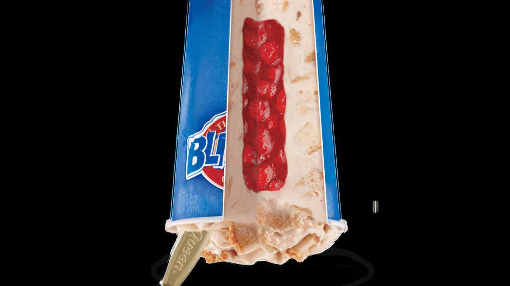 Royal New York Cheesecake Blizzard® Treat · Cheesecake pieces and graham blended with creamy soft serve then filled with a perfectly paired strawberry topping center.